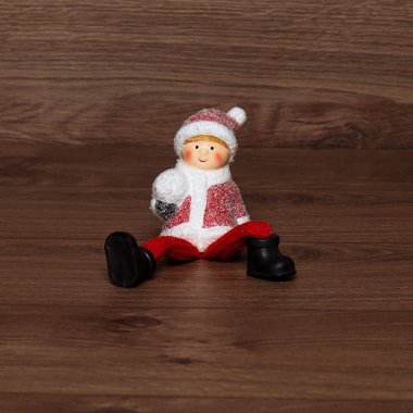 Фотография товара 'Neon-night Керамическая фигурка Мальчик с подвесными ножками, 6.6х5.5х9.5 см 505-024'